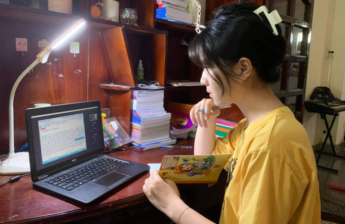 Học sinh trường THCS - THPT Đào Duy Anh, TP HCM học trực tuyến, tháng 9/2021. Ảnh: Trần Minh